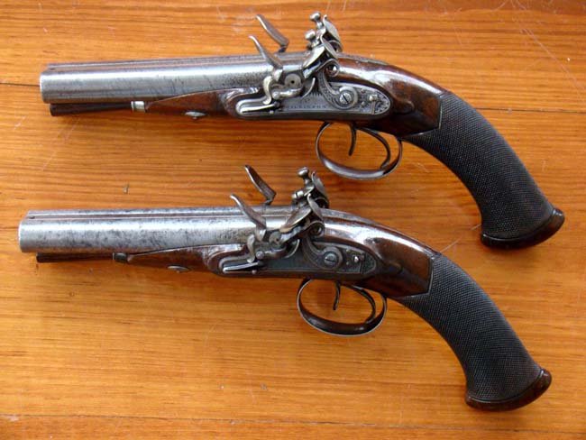 A fine pair of Double Barreled English Flintlock Coach Pistols by James Wilkinson, London, circa 1810, Gunmaker to His Majesty King George III. — image 3